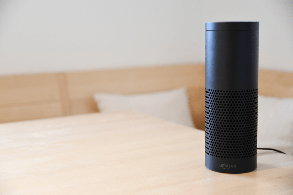 black amazon echo on a wooden table