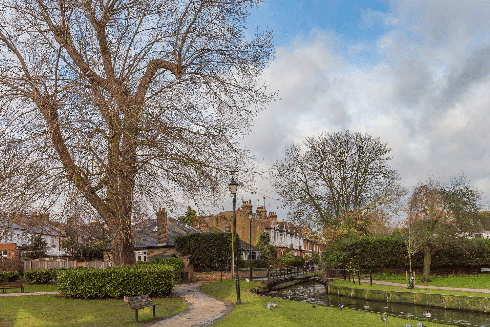 a park leading to houses in enfield, london