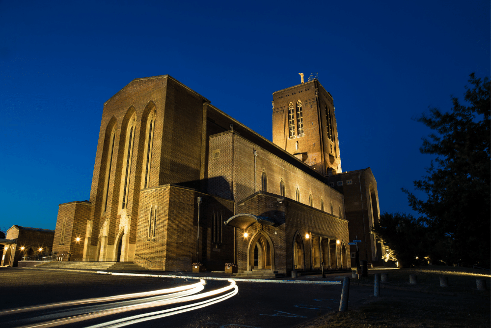 guildford cathedral lit up at night