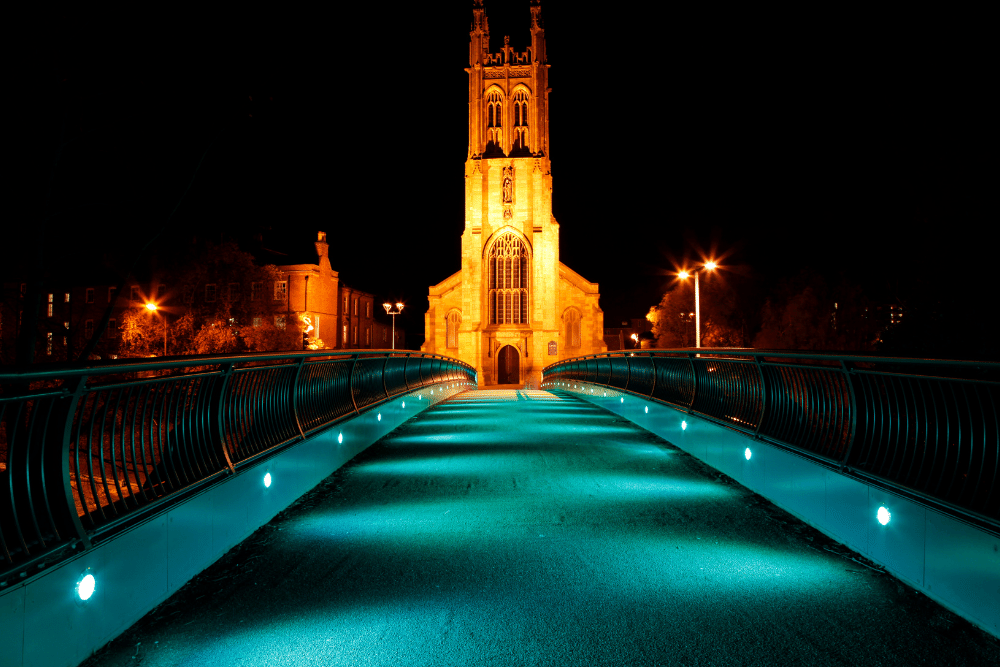 saint mary's church in derby, england, lit up at night
