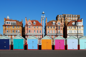 multicoloured beach huts on brighton beachfront
