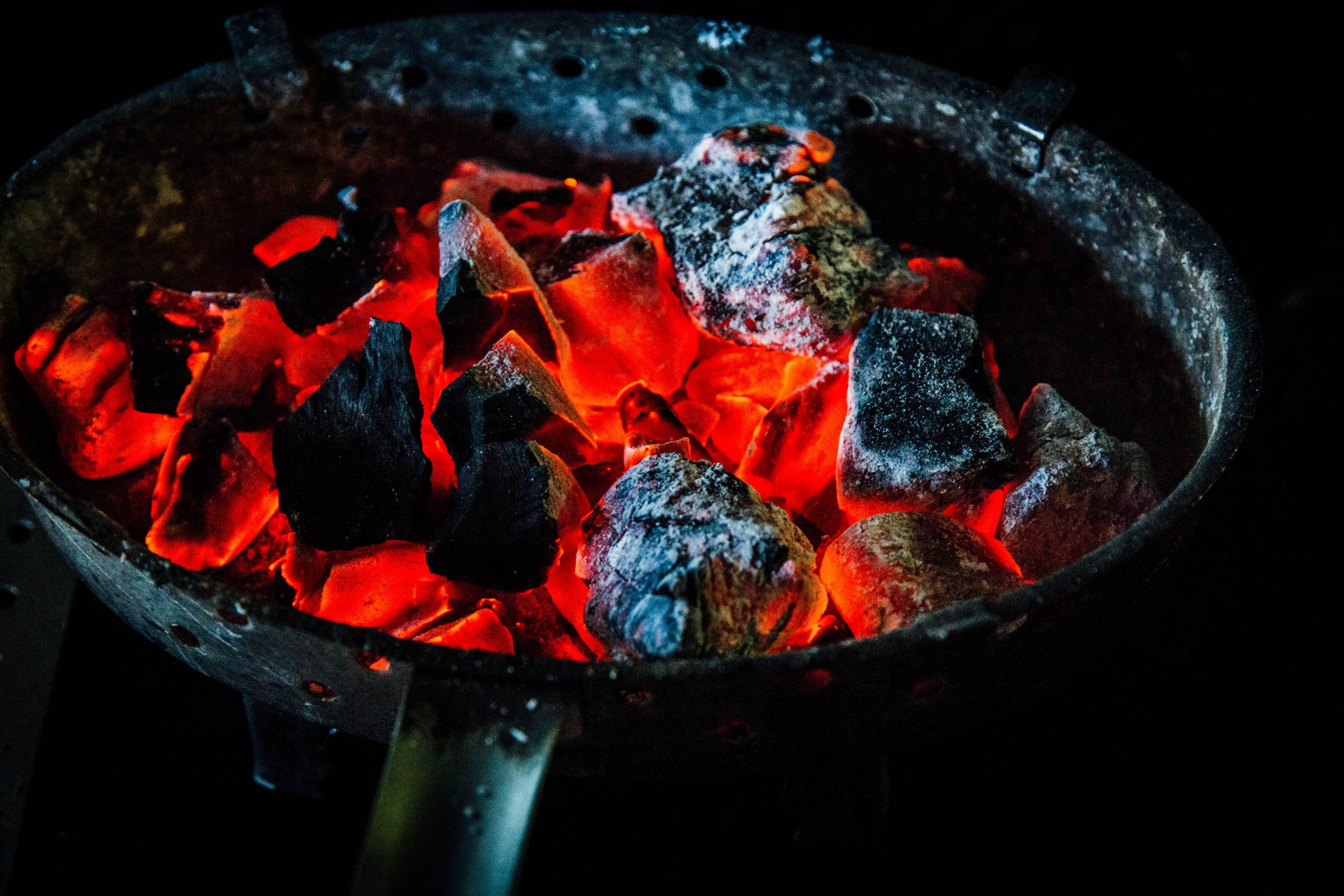 Red hot coal emitting carbon monoxide